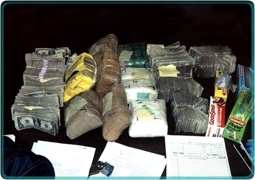 Money and drugs on table